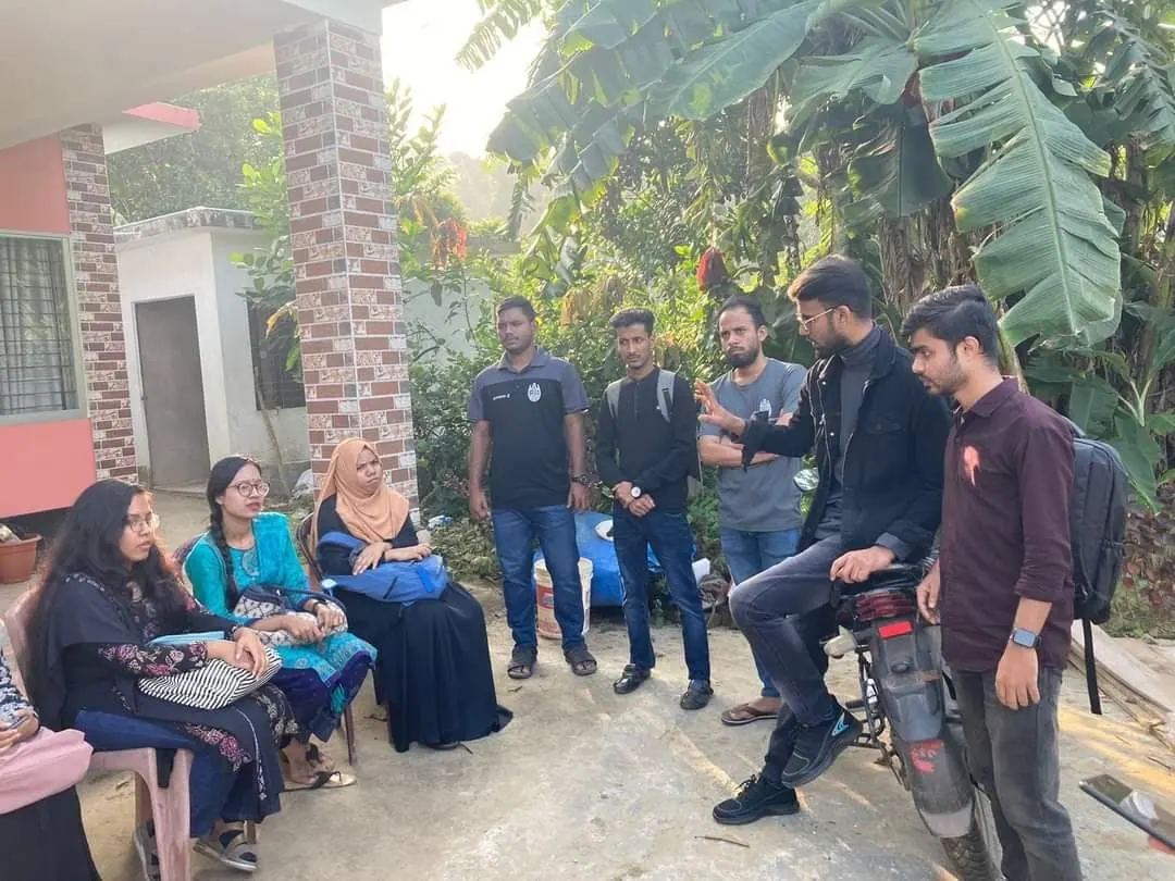 BioPC members briefing a group of students outdoors during a field visit